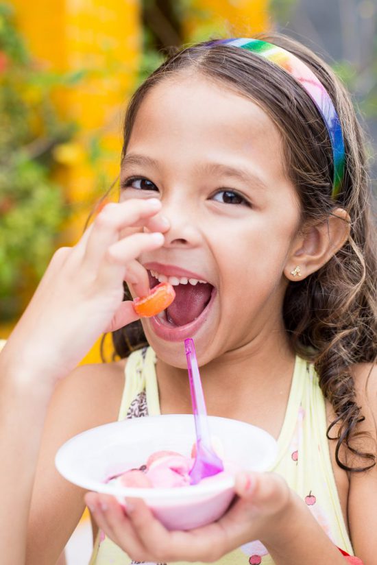 kid eating candy