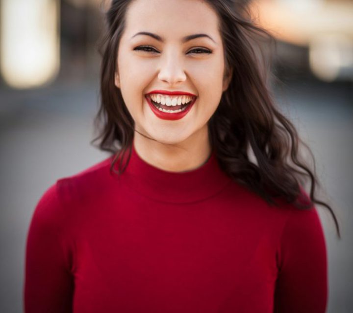 beautiful smiling lady in red dress