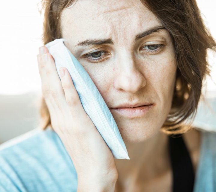 patient with tooth ache