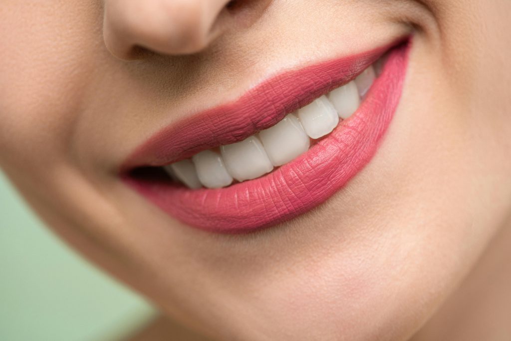 smile with pink lipstick